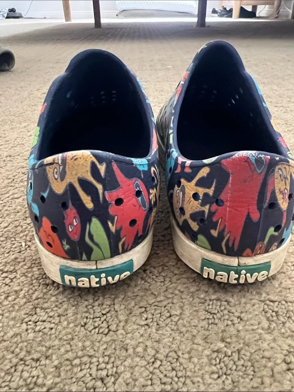 Native Kids Slip-On Shoes in Black with Multicolor Monster Print